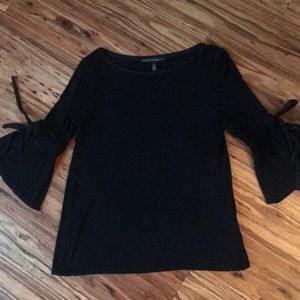 Black bell sleeved knit top with ties on sleeves